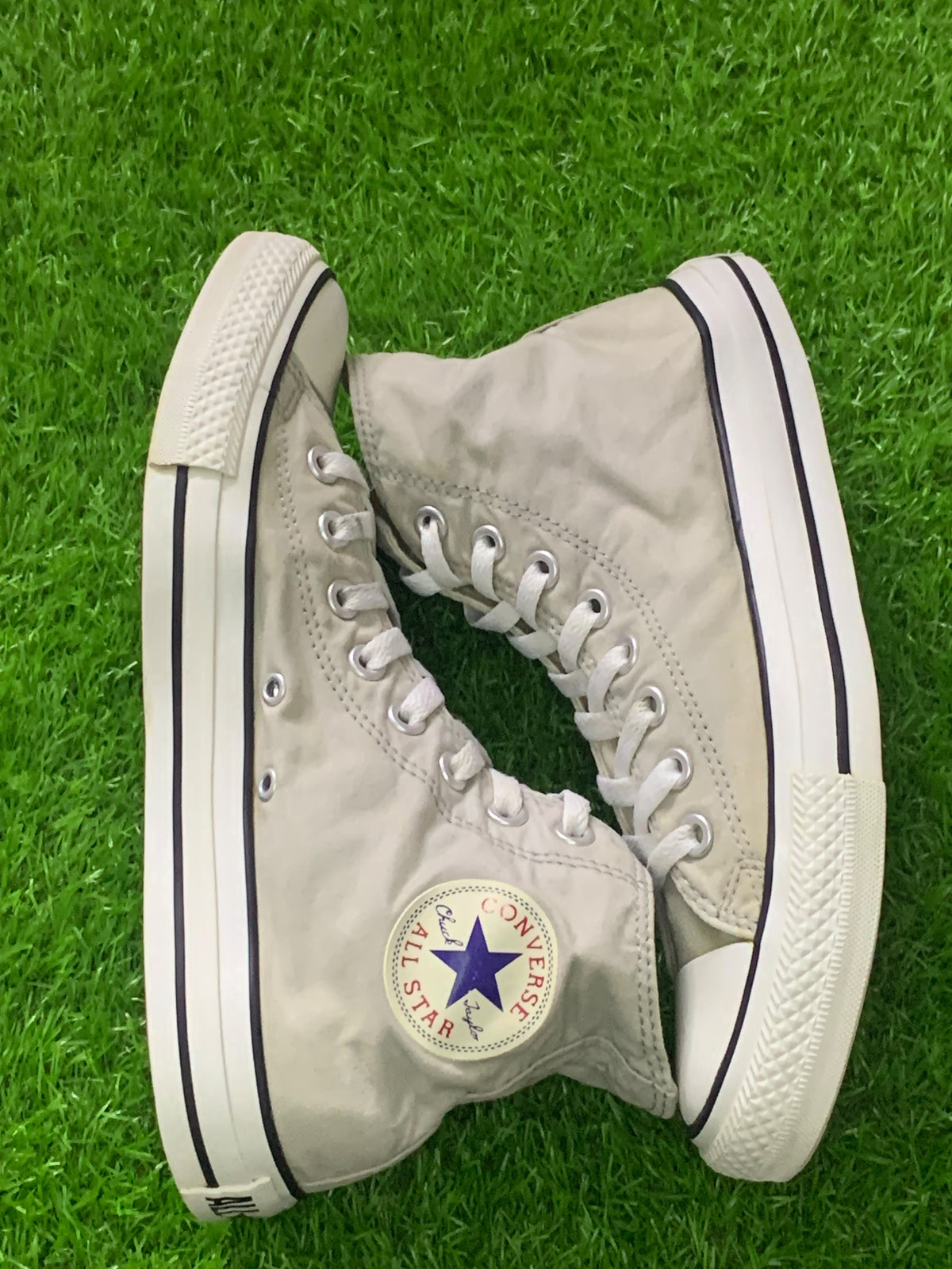 Converse light grey high-top pair opposite side photo