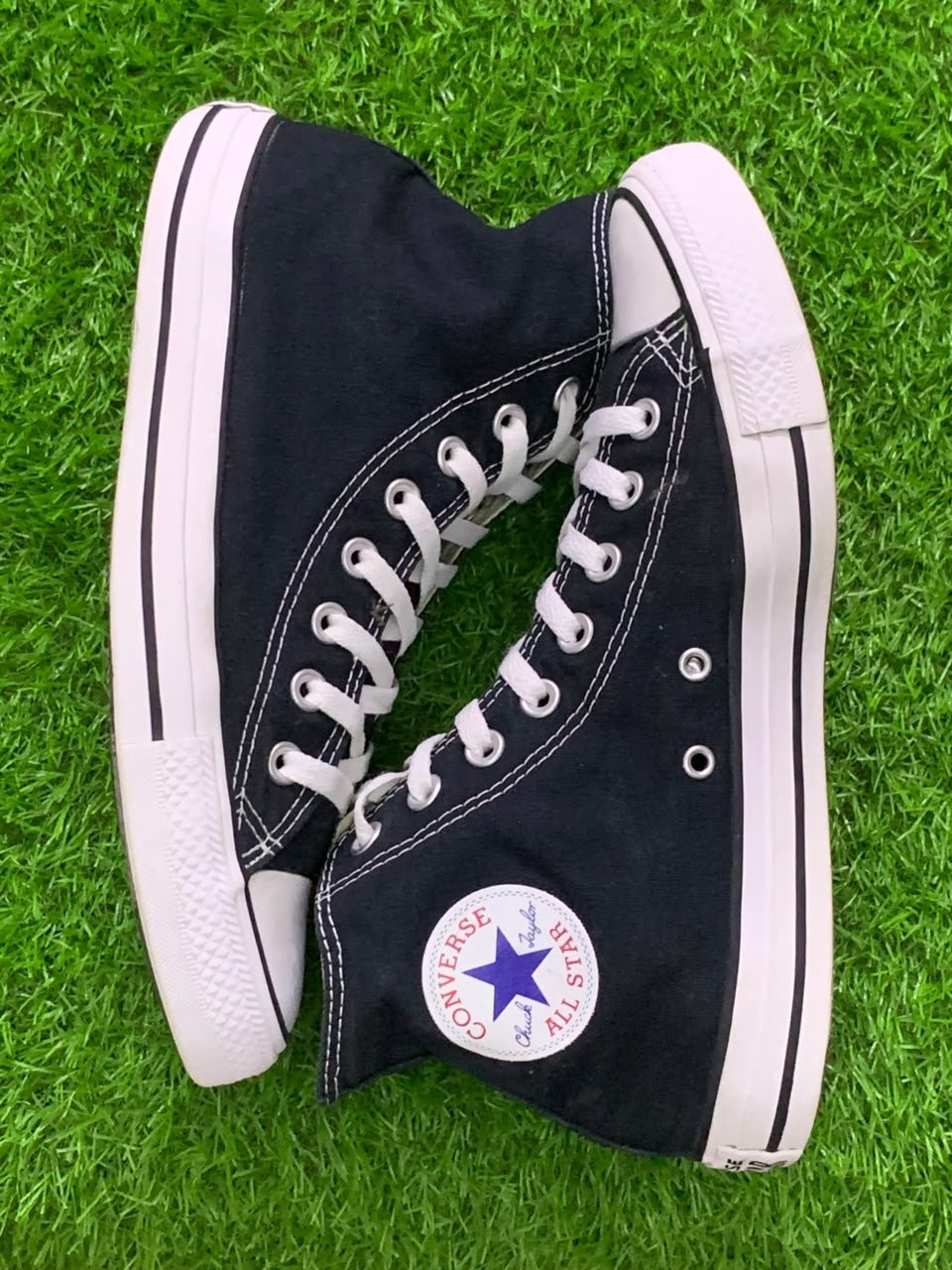 Converse Chuck Taylor All Star black canvas high-top opposite side view
