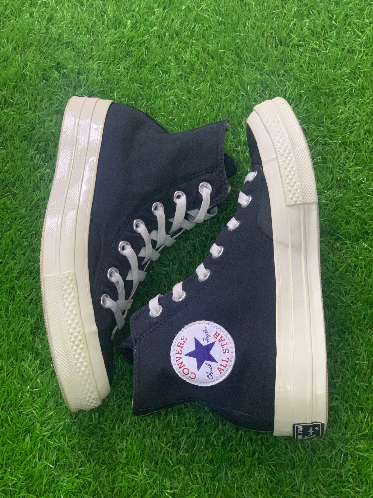 Converse black high-top sneakers opposite side view