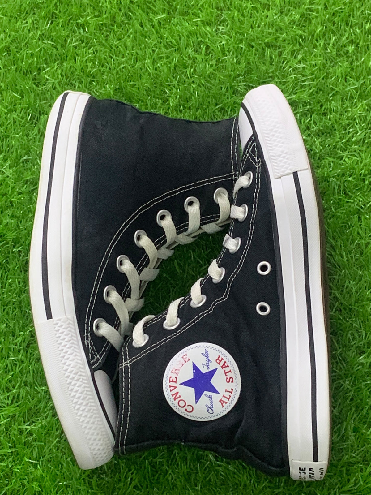 Converse black high-top pair opposite side photo