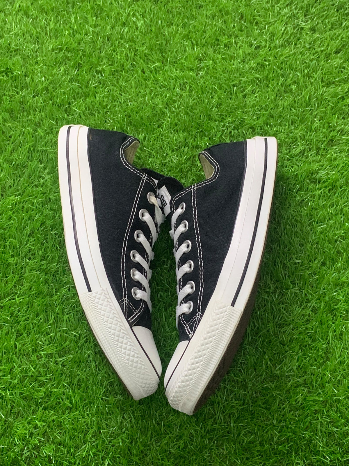 Converse black low-top pair original side view