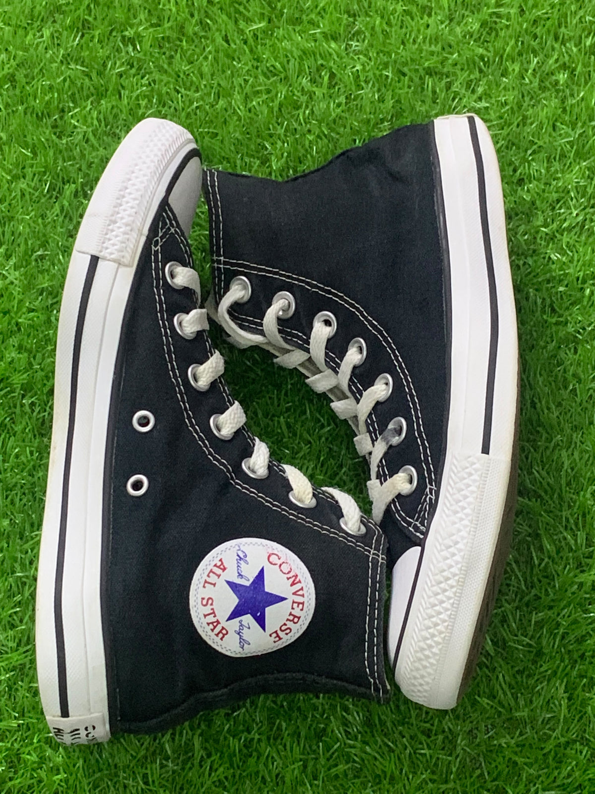 Converse black high-top pair original side photo