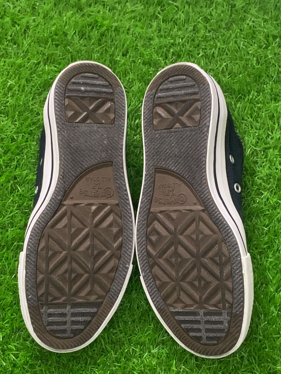 Black Converse Chuck Taylor sneakers side view